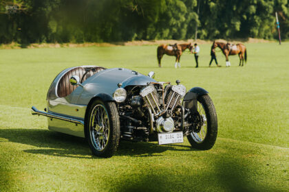 Custom three-wheeler with Mazda engine and motorcycle parts